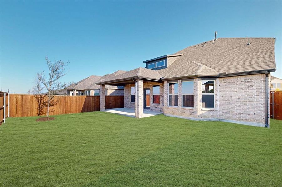 Front exterior of a new home in Lilyana, Celina, TX, highlighting curb appeal (Image 21). Front exterior of a new home in Lilyana, Celina, TX, highlighting curb appeal (Image 21).
