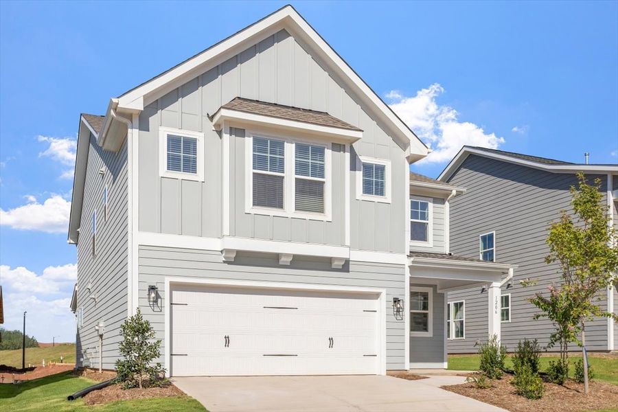 Front exterior of a new home in Sweetbrier, Durham, NC, highlighting curb appeal (Image 22).