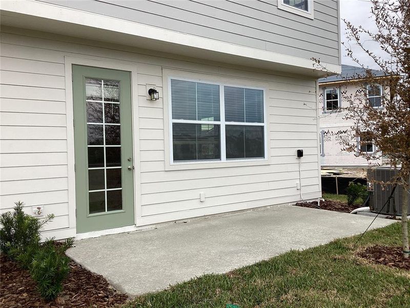 Front exterior of a home in the The Enclaves at Festival Cove community, located in Davenport, FL (Image 11).