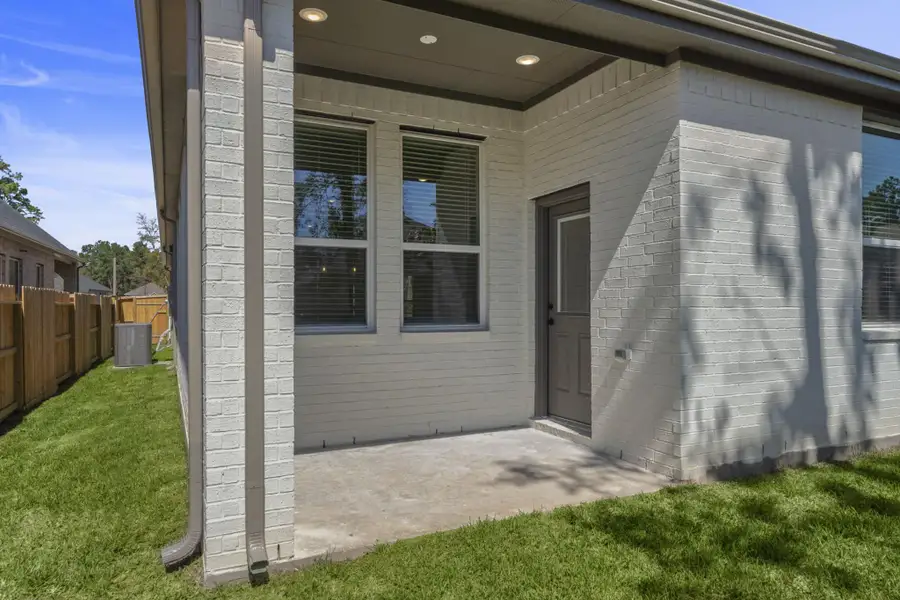 Exterior details and patio area of a home in The Woodlands Hills, Willis (Image 3). Exterior details and patio area of a home in The Woodlands Hills, Willis (Image 3).