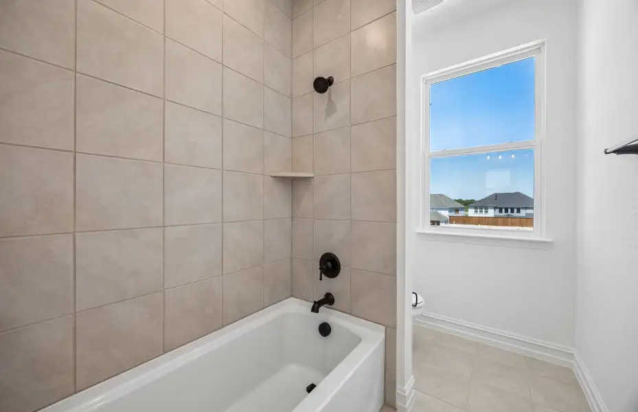 Furnished interior view inside a new home in Highland Lakes, McKinney (Image 6).