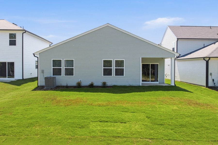 Exterior details and patio area of a home in Carpenter Falls, Durham (Image 32).