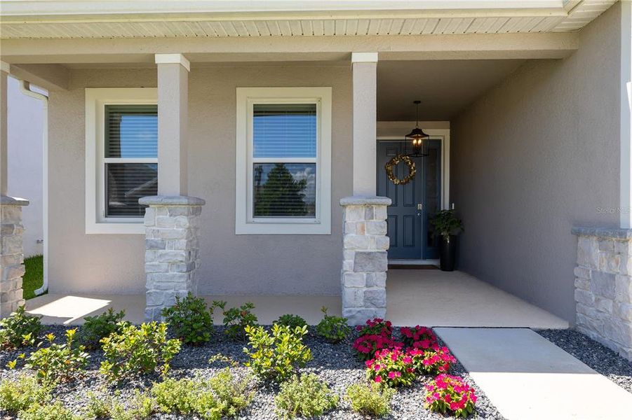 Exterior details and patio area of a home in Farm at Varrea, Plant City (Image 3).
