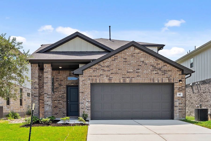 Front exterior of a new home in Crosswinds, Kyle, TX, highlighting curb appeal (Image 3).