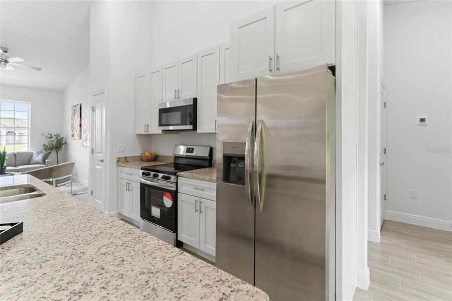 Furnished interior view inside a new home in , Kissimmee (Image 46).
