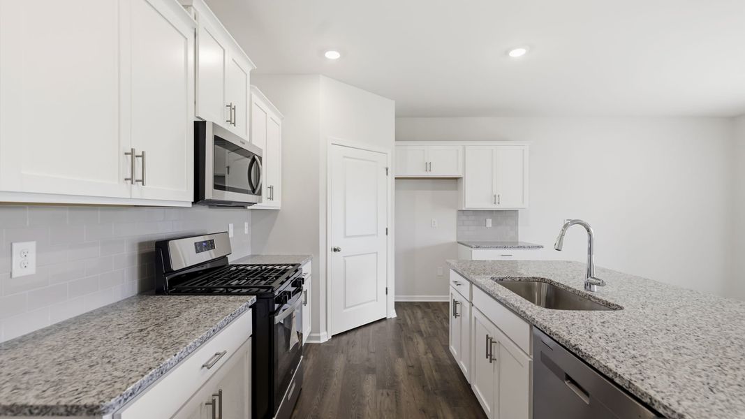Furnished interior view inside a new home in Tap Root Farms, Fletcher (Image 7).