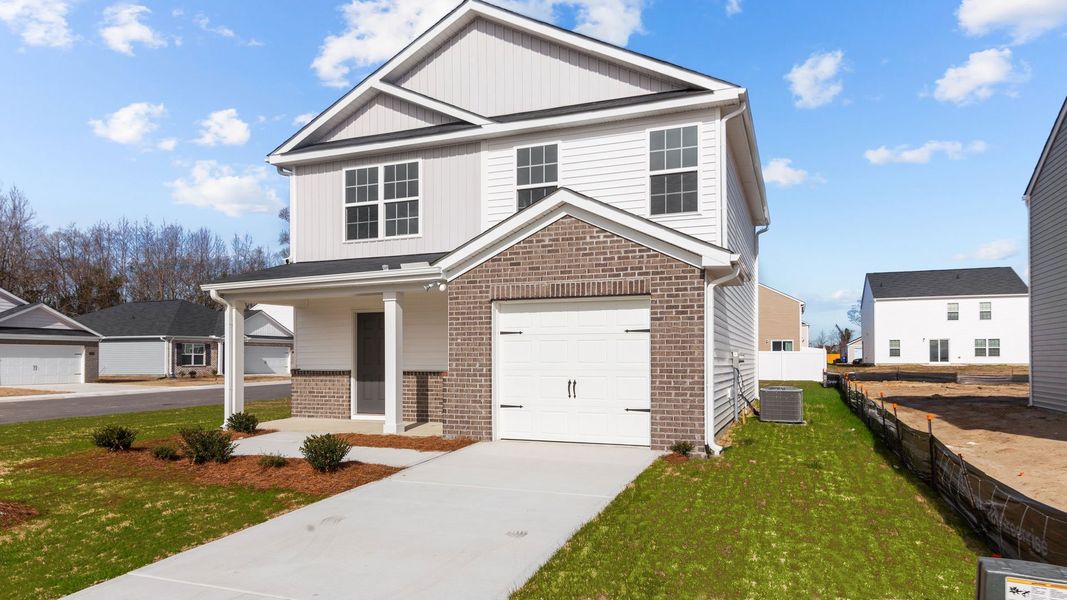 Representative exterior photo of a completed home built from the Oliver by D.R. Horton in Carter Ridge, Greenville, NC (Image 12).