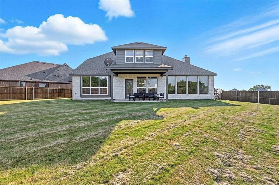 Exterior details and patio area of a home in Villages of Walnut Grove, Midlothian (Image 23).