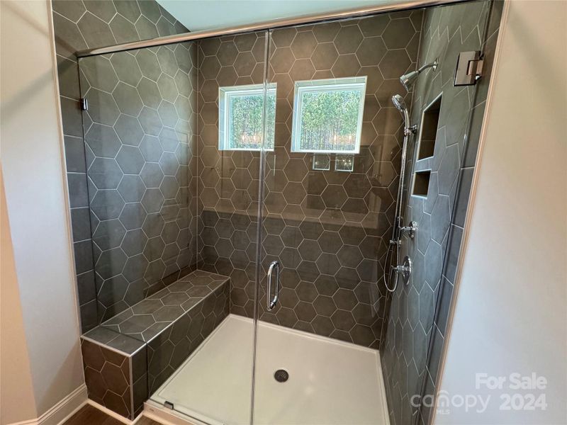 Primary Shower with Bench Seat