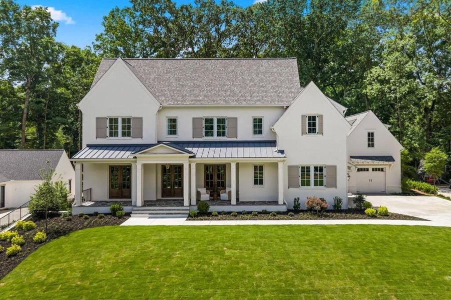 Front exterior of a new home in , Sandy Springs, GA, highlighting curb appeal (Image 1). Front exterior of a new home in , Sandy Springs, GA, highlighting curb appeal (Image 1).