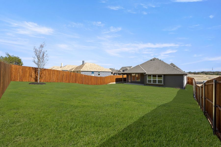 Exterior details and patio area of a home in Waterford Park, Weatherford (Image 23).
