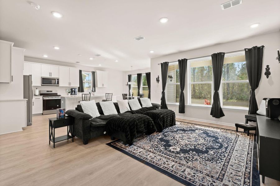 Furnished interior view inside a new home in Jasmine Point at Lakes of Cane Bay, Summerville (Image 5).