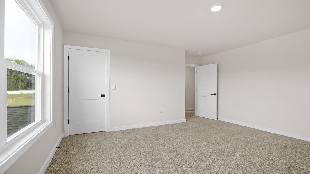 Representative unfurnished interior of a home built from the BERKSHIRE by D.R. Horton in Sycamore Cove, Woodruff (Image 24).