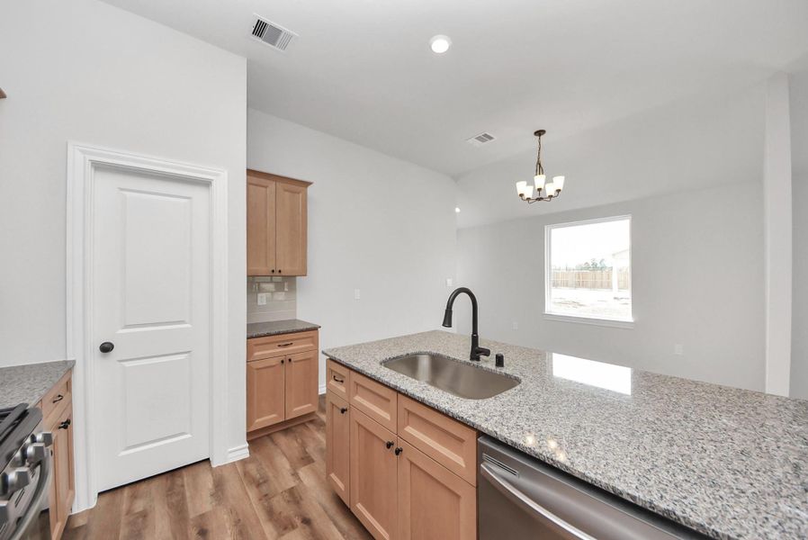 Furnished interior view inside a new home in Hill & Dale Ranch, Splendora (Image 29).