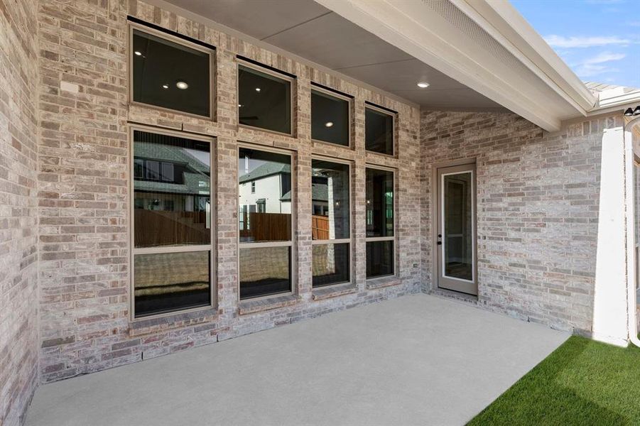 Exterior details and patio area of a home in Collinsbrook Farm, Frisco (Image 3).