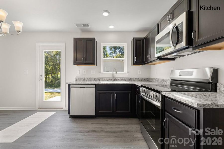 Furnished interior view inside a new home in , Lancaster (Image 6).