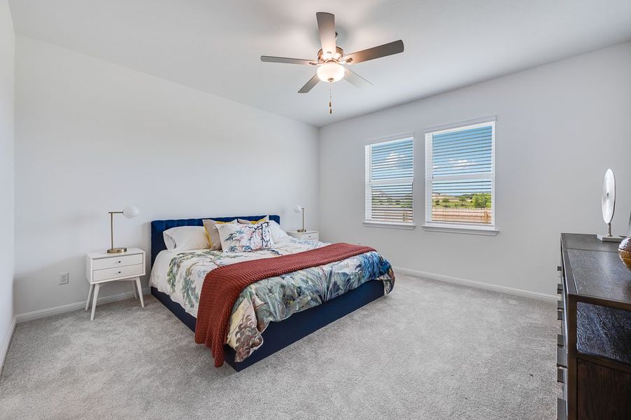 Representative furnished interior of a home built from the Sparrow by Taylor Morrison in Turner's Crossing 50s, Austin (Image 10).