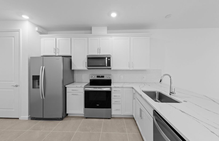 Furnished interior view inside a new home in Del Webb Naples, Ave Maria (Image 9).