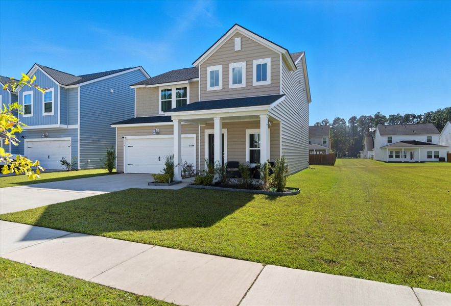 Exterior details and patio area of a home in Heron's Walk at Summers Corner: Carolina Collection, Summerville (Image 19). Exterior details and patio area of a home in Heron's Walk at Summers Corner: Carolina Collection, Summerville (Image 19).