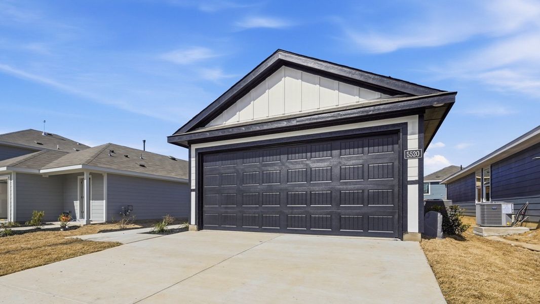 Representative exterior photo of a completed home built from the Estero by D.R. Horton in Hickory Grove, Krum, TX (Image 2).