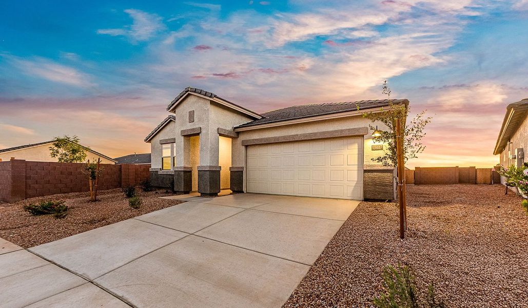Front exterior of a new home in Hanson Ridge, Vail, AZ, highlighting curb appeal (Image 23). Front exterior of a new home in Hanson Ridge, Vail, AZ, highlighting curb appeal (Image 23).