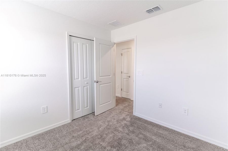 Spacious, unfurnished interior of a new home in Inman Groves, Winter Haven (Image 36). Spacious, unfurnished interior of a new home in Inman Groves, Winter Haven (Image 36).