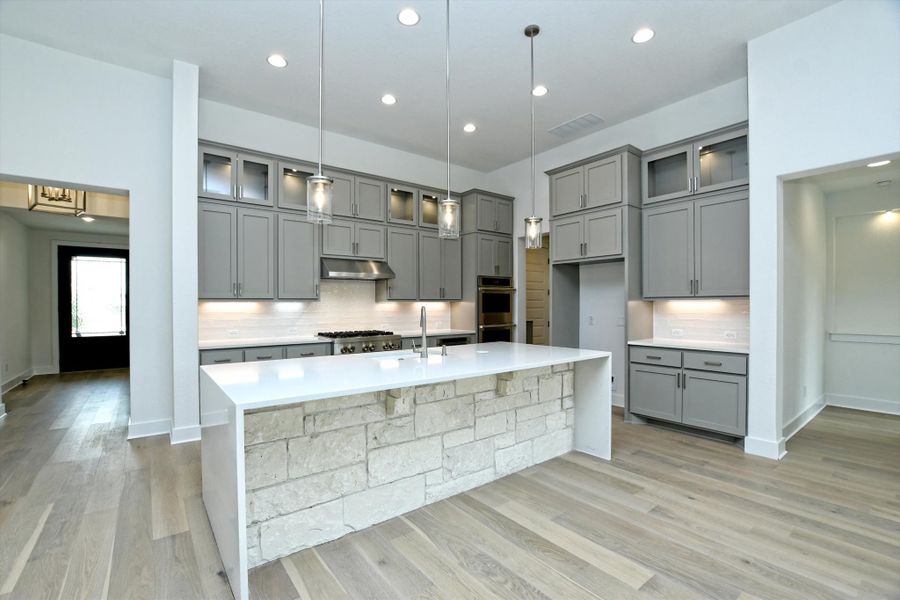 Representative furnished interior of a home built from the Madera II by Giddens Homes in Scofield Farms Estates, Georgetown (Image 274).