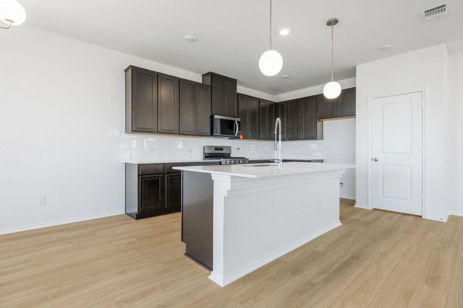 Furnished interior view inside a new home in Salerno - Heritage Collection, Round Rock (Image 7). Furnished interior view inside a new home in Salerno - Heritage Collection, Round Rock (Image 7).