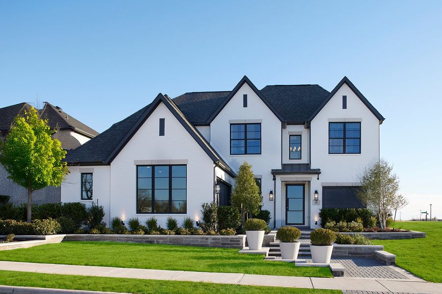 Representative exterior photo of a completed home built from the Huntington - SH 5426 by Shaddock Homes in Ridgeline, McKinney, TX (Image 25). Representative exterior photo of a completed home built from the Huntington - SH 5426 by Shaddock Homes in Ridgeline, McKinney, TX (Image 25).