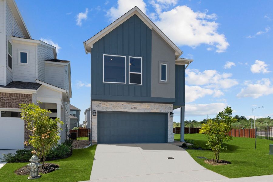 Front exterior of a new home in The Twilight at Goodnight Ranch, Austin, TX, highlighting curb appeal (Image 1). Front exterior of a new home in The Twilight at Goodnight Ranch, Austin, TX, highlighting curb appeal (Image 1).