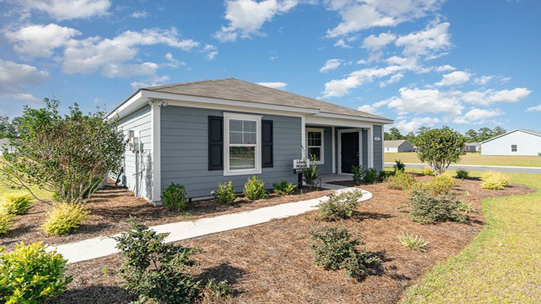 Exterior details and patio area of a home in Auberon Woods, Conway (Image 2). Exterior details and patio area of a home in Auberon Woods, Conway (Image 2).