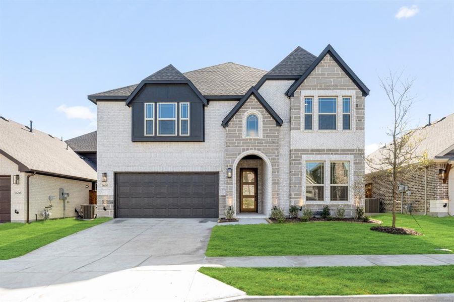 Front exterior of a new home in Willow Wood Classic 50, McKinney, TX, highlighting curb appeal (Image 2).