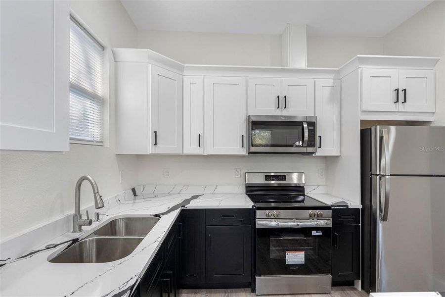 Furnished interior view inside a new home in , New Port Richey (Image 10). Furnished interior view inside a new home in , New Port Richey (Image 10).