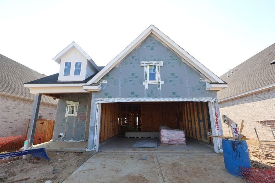 Front exterior of a new home in The Grand Prairie 40’, Hockley, TX, highlighting curb appeal (Image 21).