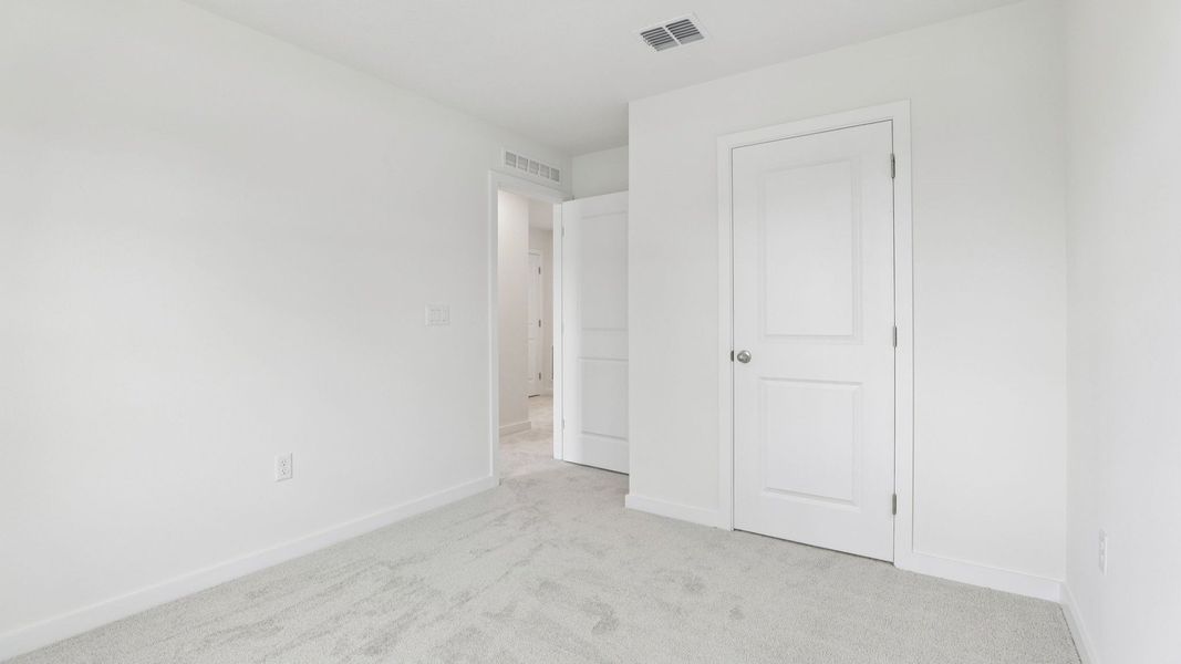 Furnished interior view inside a new home in Cyrene at Harmony, St. Cloud (Image 36).