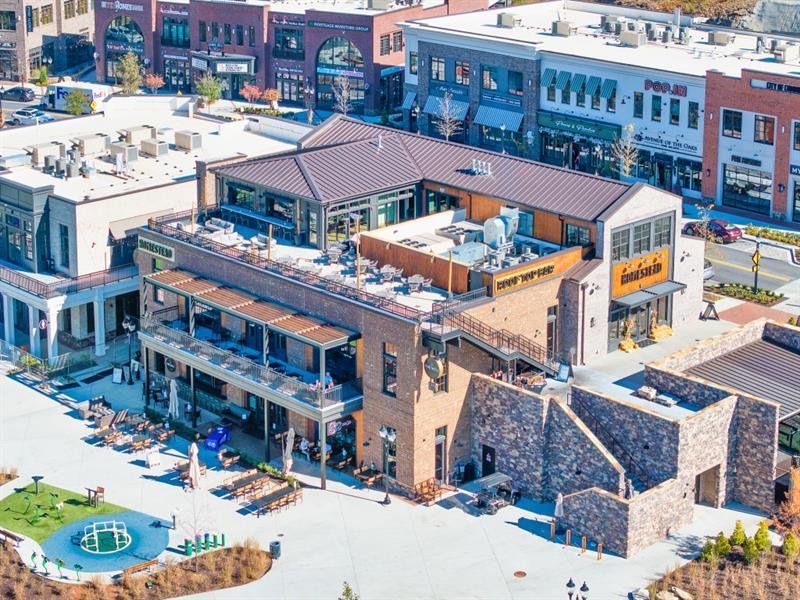 Front exterior of a new home in Hillshire, Cumming, GA, highlighting curb appeal (Image 27). Front exterior of a new home in Hillshire, Cumming, GA, highlighting curb appeal (Image 27).