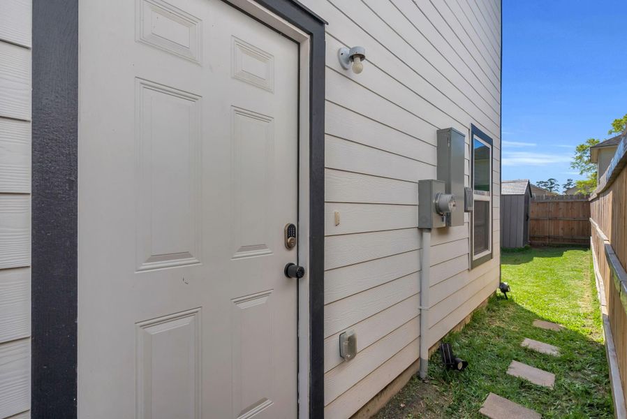 This photo shows the side entrance of Unit B, Let's take a tour. Each unit has a private yard for entertainment or extra storage. This photo shows the side entrance of Unit B, Let's take a tour. Each unit has a private yard for entertainment or extra storage.