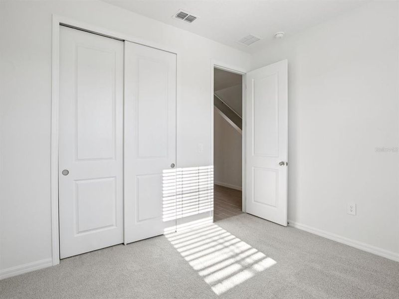 Spacious, unfurnished interior of a new home in Coasterra - Reserve Series, Palmetto (Image 21).