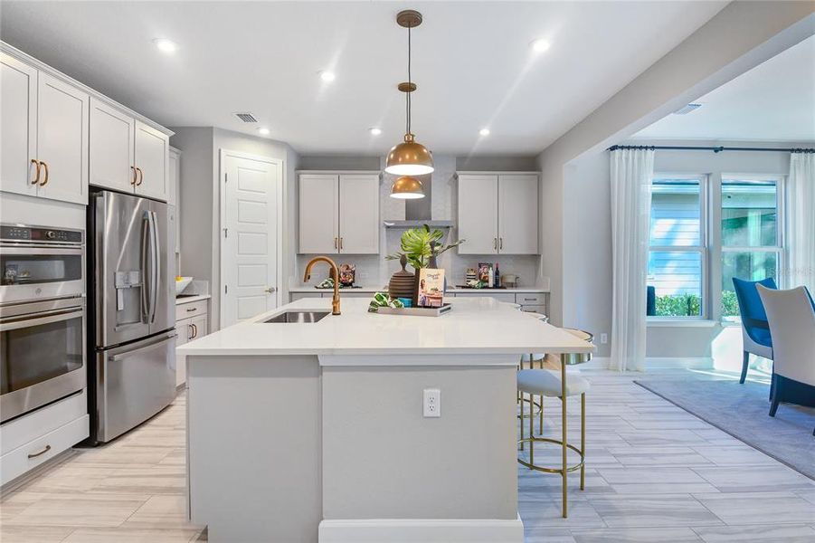 Furnished interior view inside a new home in Coastal Gardens, Palm Coast (Image 17).