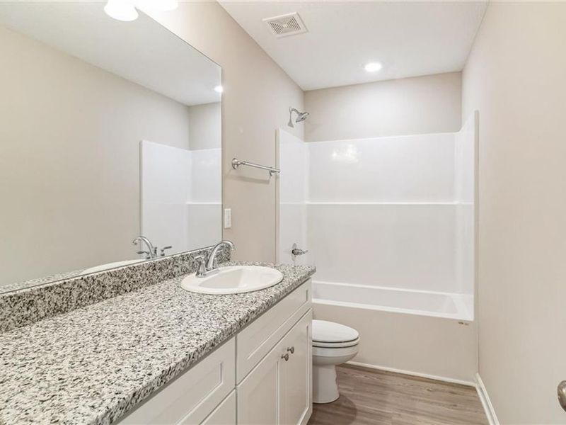 Furnished interior view inside a new home in Ivy Glen, Perry (Image 5).