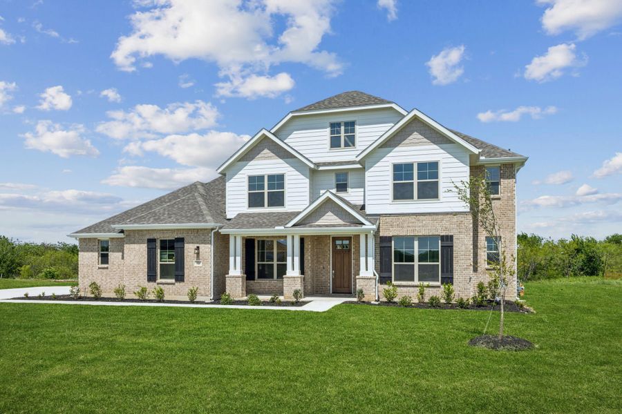 Front exterior of a new home in Ellis Ranch Estates, Waxahachie, TX, highlighting curb appeal (Image 2). Front exterior of a new home in Ellis Ranch Estates, Waxahachie, TX, highlighting curb appeal (Image 2).