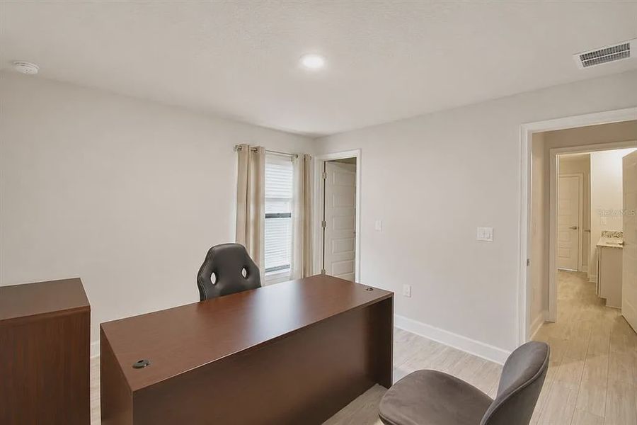 Furnished interior view inside a new home in Lake Juliana Estates, Auburndale (Image 32).