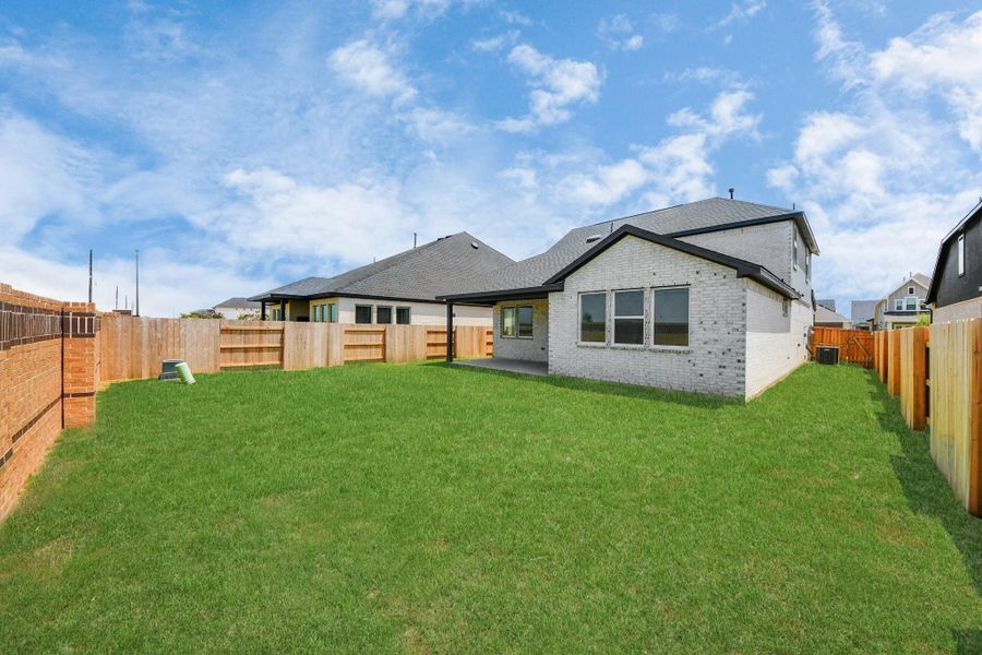 Exterior details and patio area of a home in 45' Traditional Homes at Elyson, Katy (Image 4).