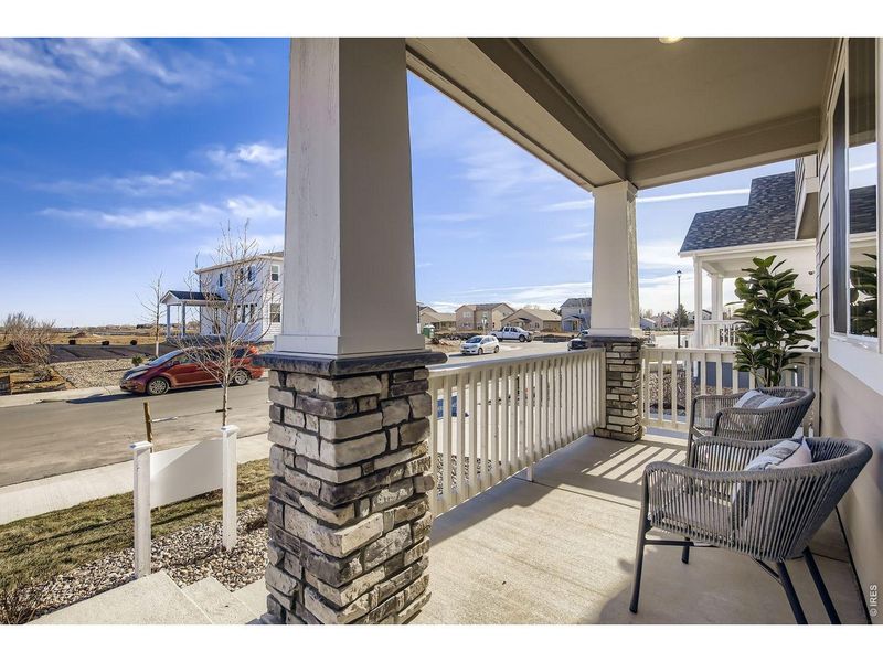Exterior details and patio area of a home in Farmstead, Berthoud (Image 23).
