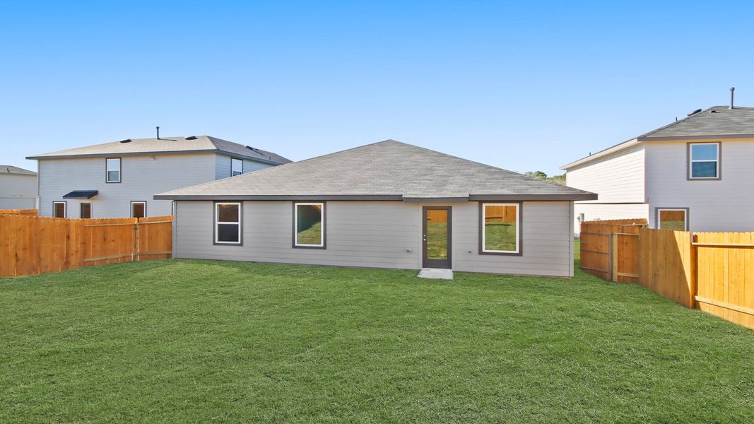 Exterior details and patio area of a home in Westward Pointe, Sealy (Image 4).
