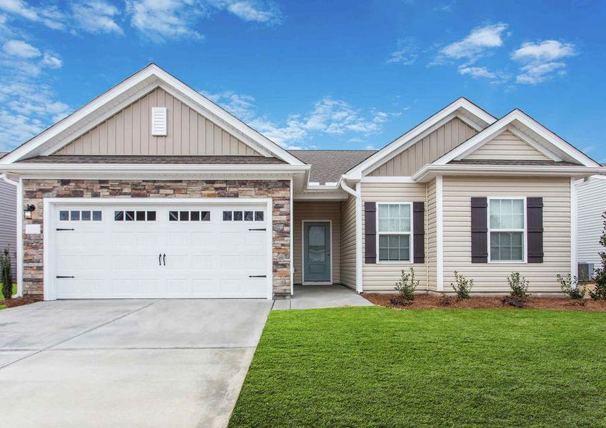 Alexander floor plan front yard with landscaping, carriage garage door, and brown shutters