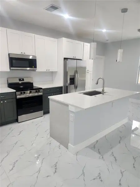 Furnished interior view inside a new home in , Port Charlotte (Image 5).