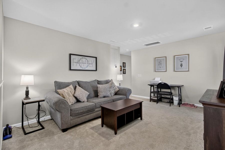 Furnished interior view inside a new home in Lindera Preserve at Cane Bay Plantation, Summerville (Image 10).