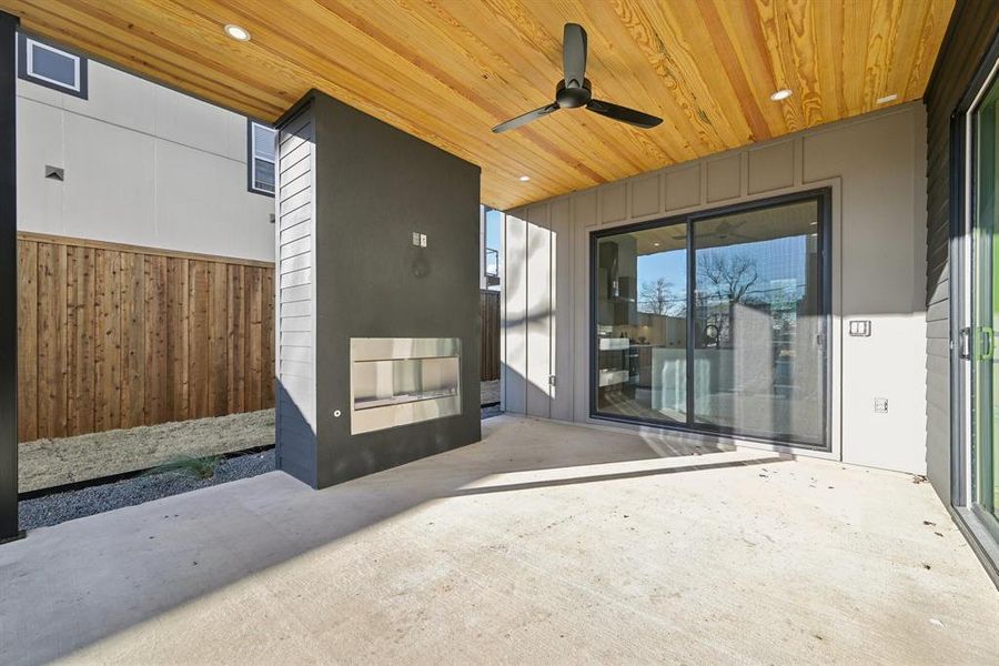 View of patio featuring ceiling fan