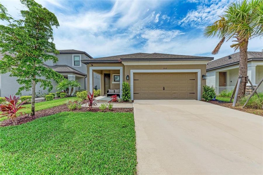 Front exterior of a new home in , Nokomis, FL, highlighting curb appeal (Image 19).